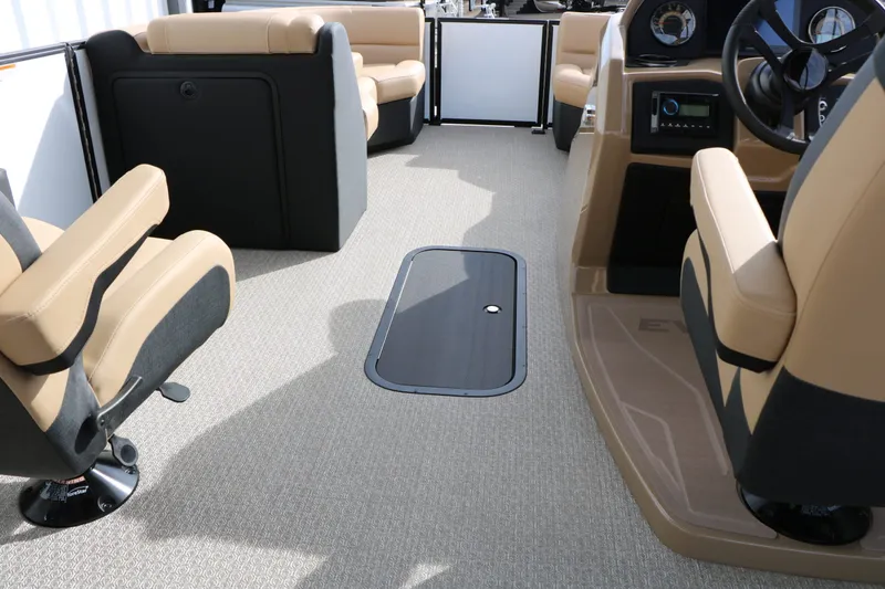 Slide: The Image of Interior of 2026 Evotti 523 CS Tri Toon with beige seating. - 37
