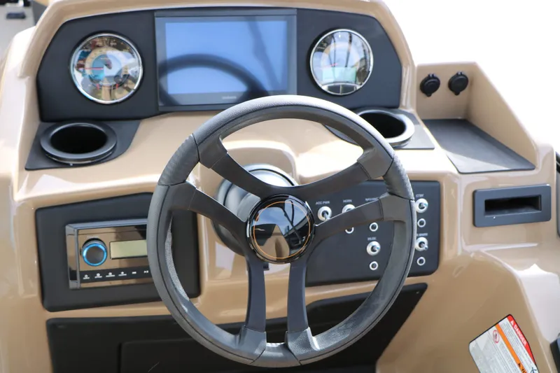 Slide: The Image of Dashboard of the 2026 Evotti 523 CS Tri Toon. - 38