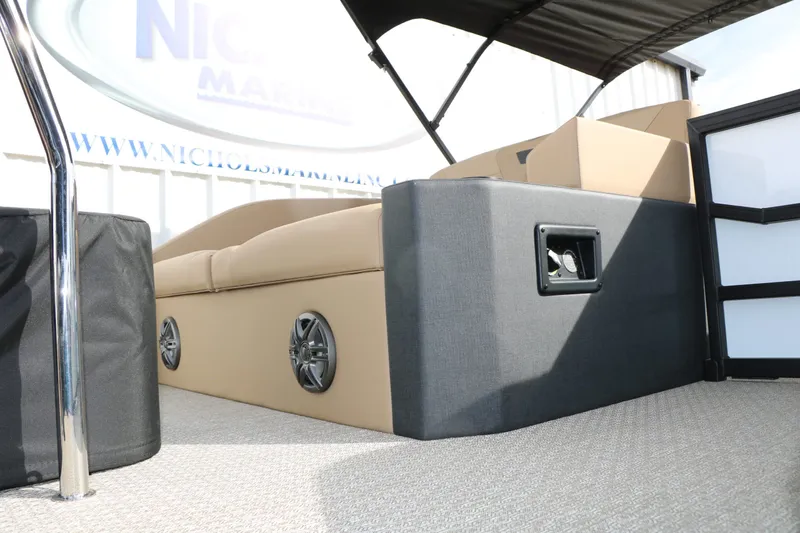 Slide: The Image of Interior of 2026 Evotti 523 CS Tri Toon with speakers. - 49