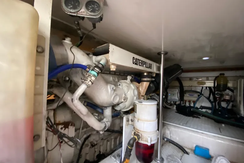 Slide: The Image of Engine room of 2001 Egg Harbor 37 Convertible with Caterpillar engine components. - 33