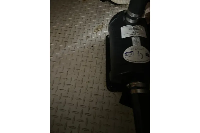 Slide: The Image of Engine room detail of 2001 Egg Harbor 37 Convertible with diamond plate flooring. - 48