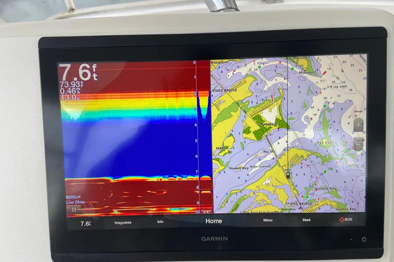 Slide: The Image of Garmin marine display showing sonar and navigation map on Egg Harbor 37 Convertible, 2001 model. - 60