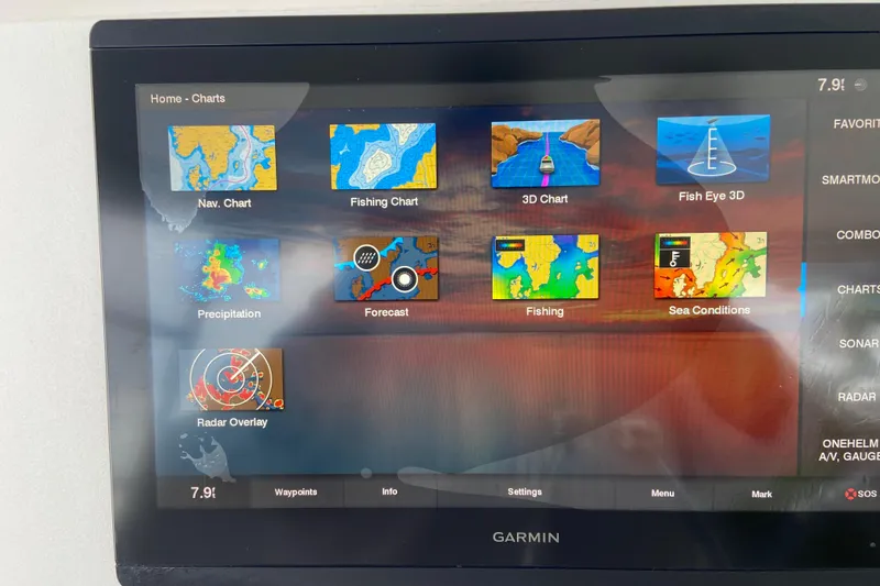 Slide: The Image of Garmin marine display showing navigation, fishing charts, and radar on Egg Harbor 37 Convertible, 2001. - 61