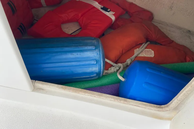 Slide: The Image of Life jackets and fenders in Egg Harbor 37 Convertible boat storage, 2001 model. - 65