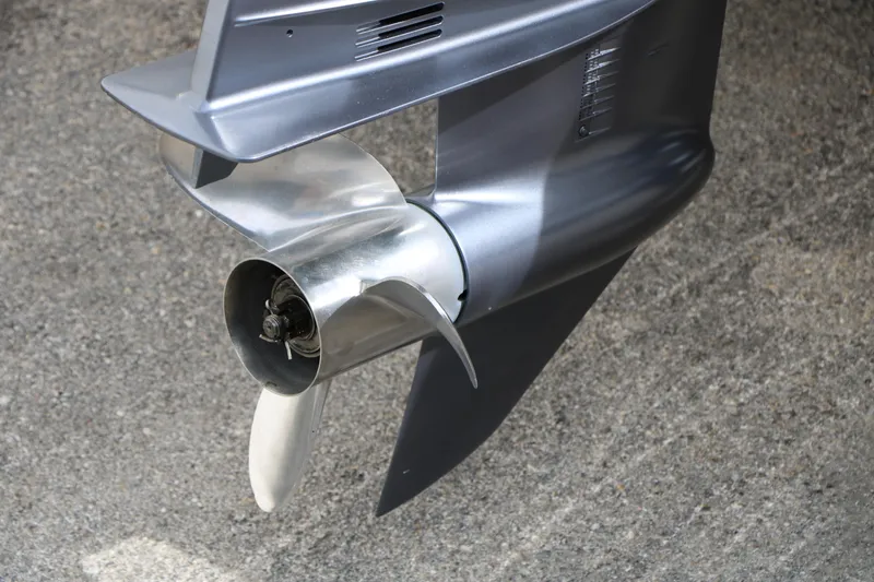 Slide: The Image of 2007 Skeeter SX180 boat propeller on concrete surface. - 12