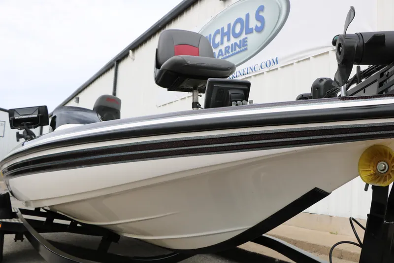 Slide: The Image of 2007 Skeeter SX180 boat at Nichols Marine dealership, featuring sleek design and advanced equipment. - 23