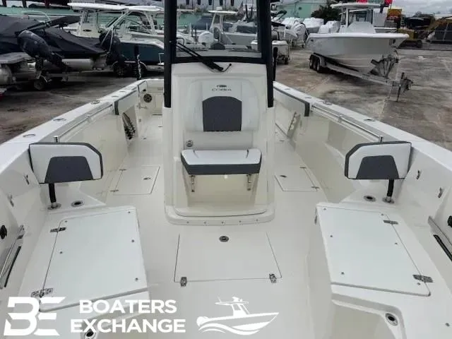 Slide: The Image of Cobia 285 Open Center Console boat, 2026 model, at a boatyard. - 8