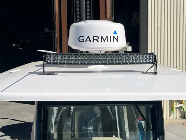 Slide: The Image of Garmin equipment on Everglades 253 Center Console boat, year 2019. - 14