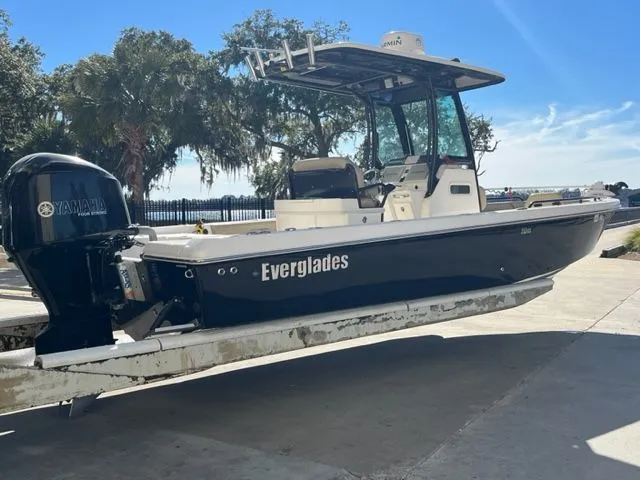 Slide: The Image of 2019 Everglades 253 Center Console boat on trailer. - 2