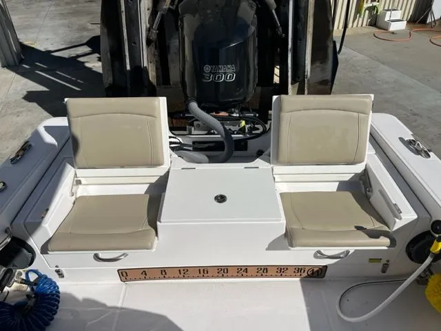 Slide: The Image of Rear view of a 2019 Everglades 253 Center Console boat with Yamaha 300 engine. - 9