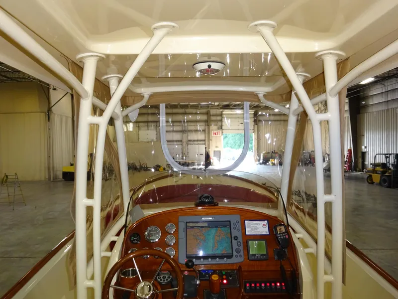 Slide: The Image of Interior view of 2007 Hinckley T29C boat cockpit with navigation equipment. - 37