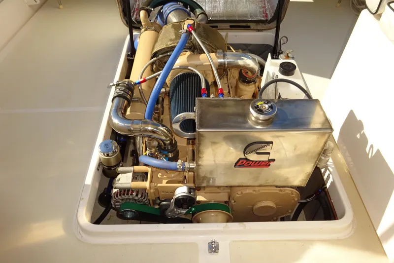 Slide: The Image of Engine compartment of 2007 Hunt Yachts Surfhunter 29 with Cummins Power system. - 59