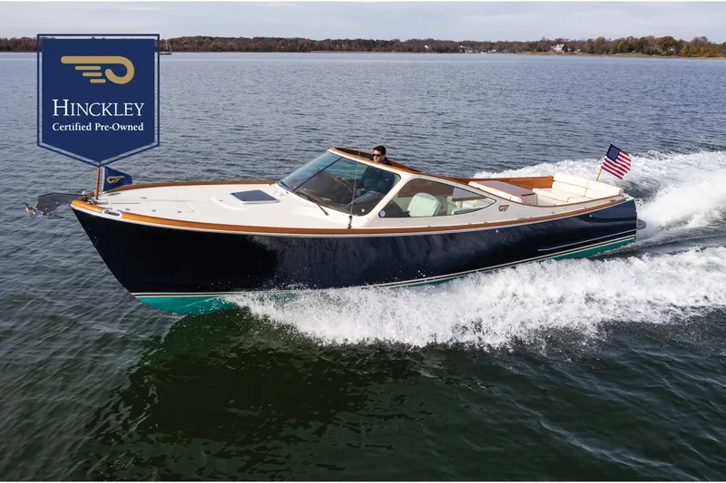 The Image of 2006 Hinckley Talaria 29 R boat cruising on open water, certified pre-owned. - 0