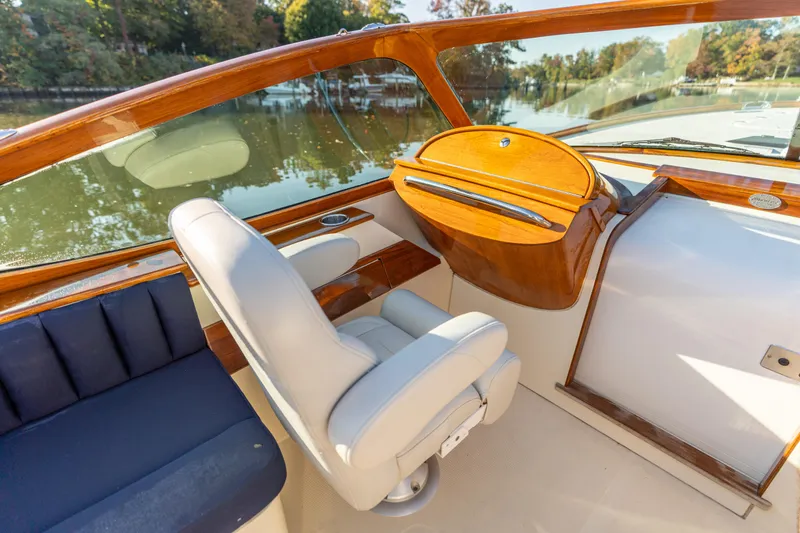 Slide: The Image of Interior of 2003 Hinckley Talaria 29 Runabout with elegant wood and leather details. - 9