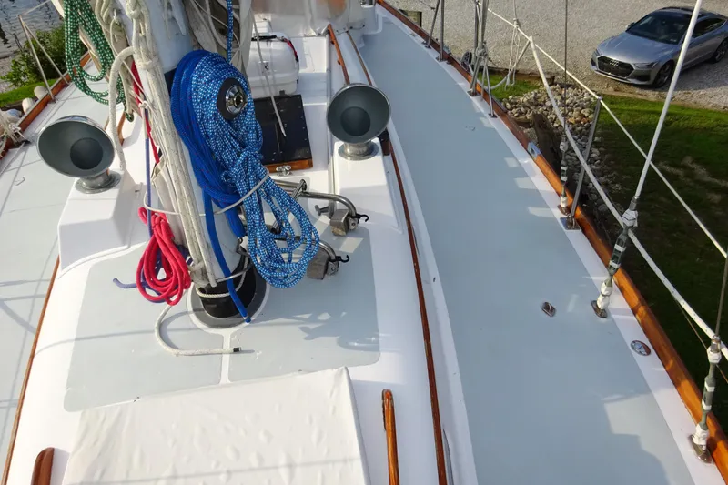 Slide: The Image of Deck of 1970 Hinckley Bermuda 40 Custom sailboat with ropes and equipment. - 24