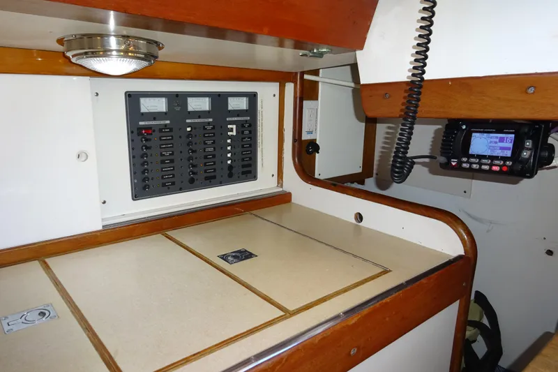 Slide: The Image of Electrical panel and radio equipment inside a 1970 Hinckley Bermuda 40 Custom sailboat. - 53