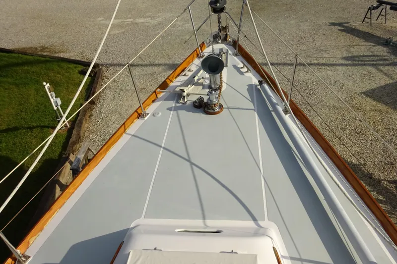 Slide: The Image of 1970 Hinckley Bermuda 40 Custom sailboat deck with polished fittings and wooden trim. - 18