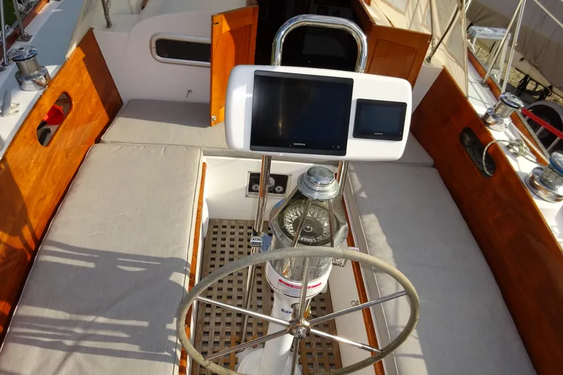 Slide: The Image of Cockpit of 1970 Hinckley Bermuda 40 Custom sailboat with modern navigation equipment. - 38