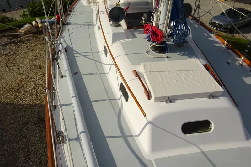 Slide: The Image of 1970 Hinckley Bermuda 40 Custom sailboat deck with ropes and fittings. - 8