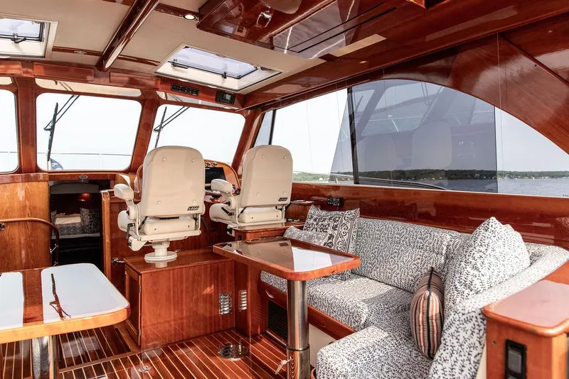 Slide: The Image of Luxurious interior of 2014 Hinckley Talaria 43 yacht with elegant wood finish. - 24