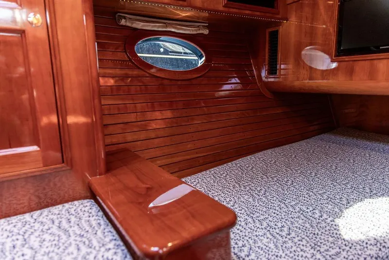 Slide: The Image of Luxurious 2014 Hinckley Talaria 43 interior with polished wood and elegant design. - 39
