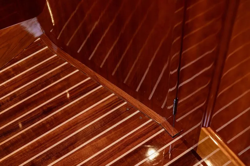 Slide: The Image of Polished wooden interior of 2014 Hinckley Talaria 43 yacht, showcasing elegant craftsmanship. - 45