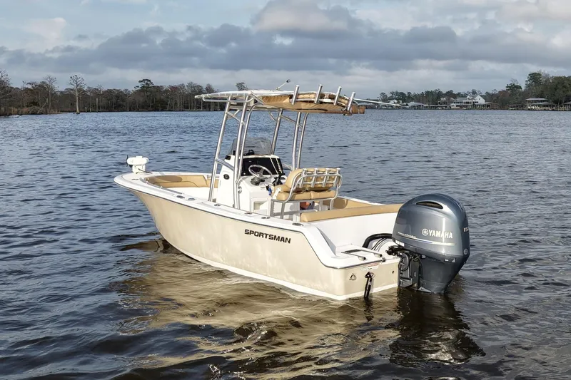 Slide: The Image of 2017 Sportsman Heritage 211 Center Console boat on calm water with Yamaha outboard. - 4