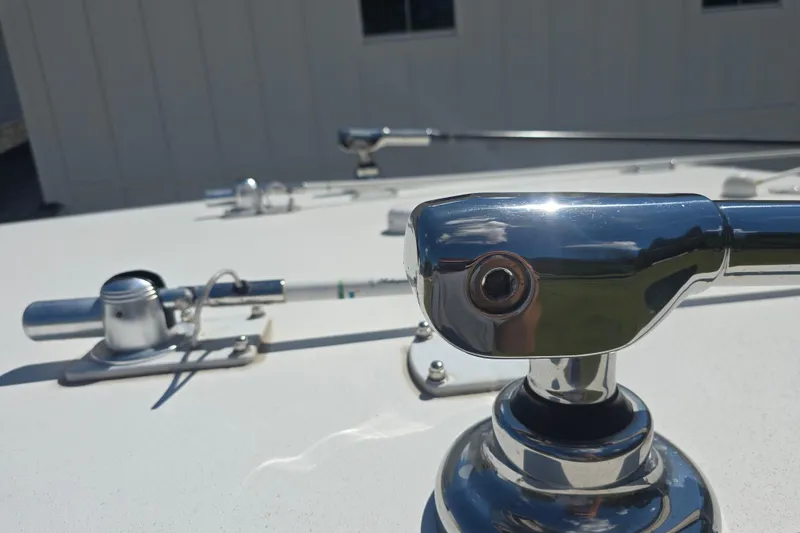 Slide: The Image of 2022 Invincible 33 Catamaran Reverso outboard flushing system with start button and water inlet. - 53