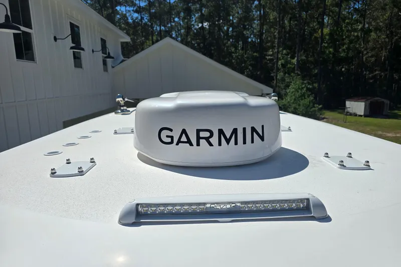 Slide: The Image of Livewell on 2022 Invincible 33 Catamaran, featuring oval design and secure lid. - 54