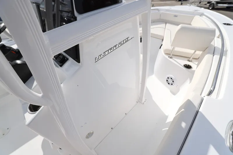 Slide: The Image of 2026 Sea Hunt Ultra 219 boat interior with seating and console details. - 13