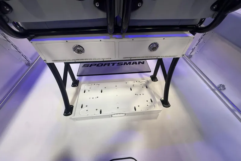 Slide: The Image of 2026 Sportsman Heritage 231 Center Console interior with storage compartments and sleek design. - 5