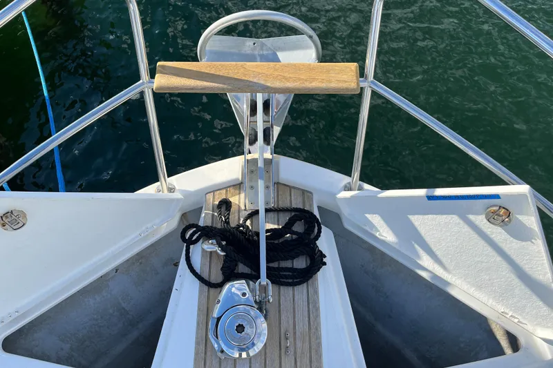 Slide: The Image of Bow of 2013 Beneteau Swift Trawler 34 with anchor and rope. - 28