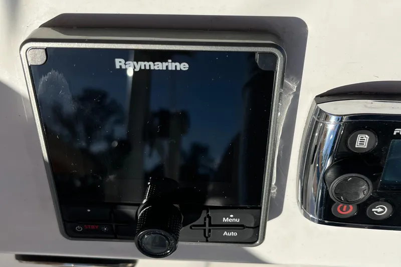 Slide: The Image of Raymarine navigation system on 2013 Beneteau Swift Trawler 34 yacht dashboard. - 39