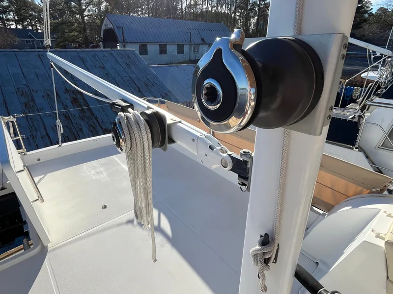Slide: The Image of 2013 Beneteau Swift Trawler 34 deck with winch and rope detail. - 44
