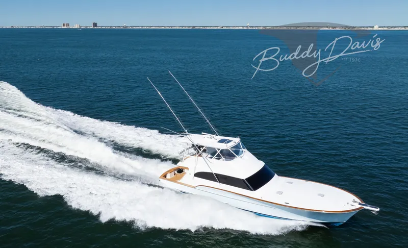 Slide: The Image of 2009 Buddy Davis Sportfish yacht cruising on open sea. - 17
