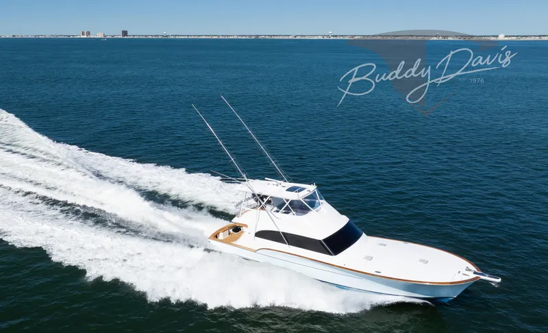 Slide: The Image of 2009 Buddy Davis Sportfish yacht cruising on open sea. - 18