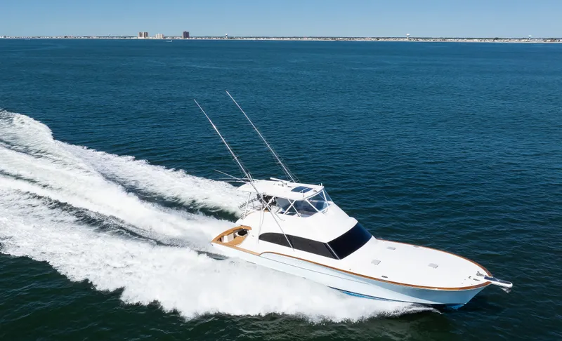 Slide: The Image of 2009 Buddy Davis Sportfish yacht cruising on open sea. - 7