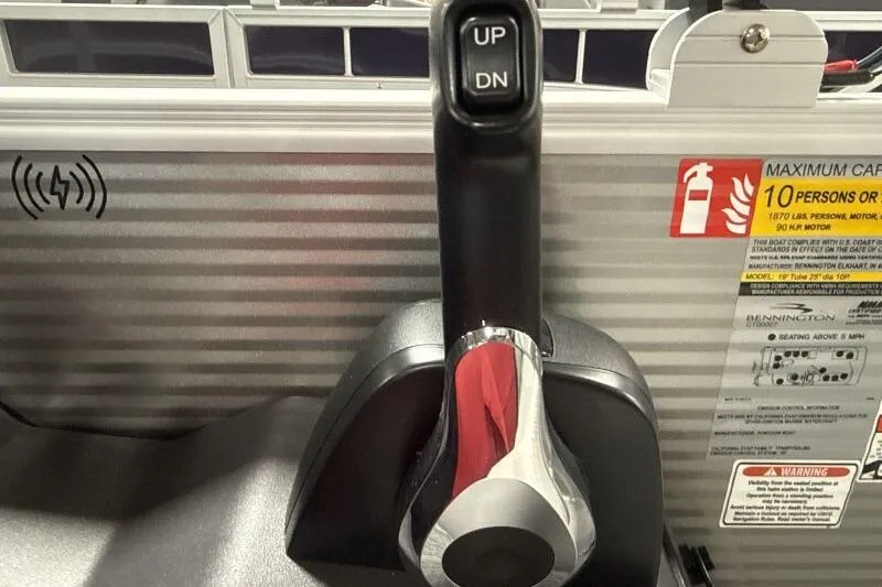 Slide: The Image of Throttle control lever on a 2026 Bennington 20 SLSF - SNAP boat dashboard. - 12