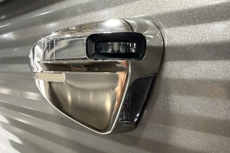 Slide: The Image of Close-up of 2026 Bennington 20 SLSF - SNAP boat detail, featuring sleek metallic design. - 14