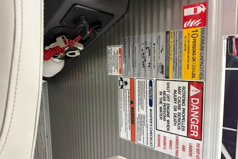 Slide: The Image of Safety and capacity labels on a 2026 Bennington 20 SLSF - SNAP boat. - 22