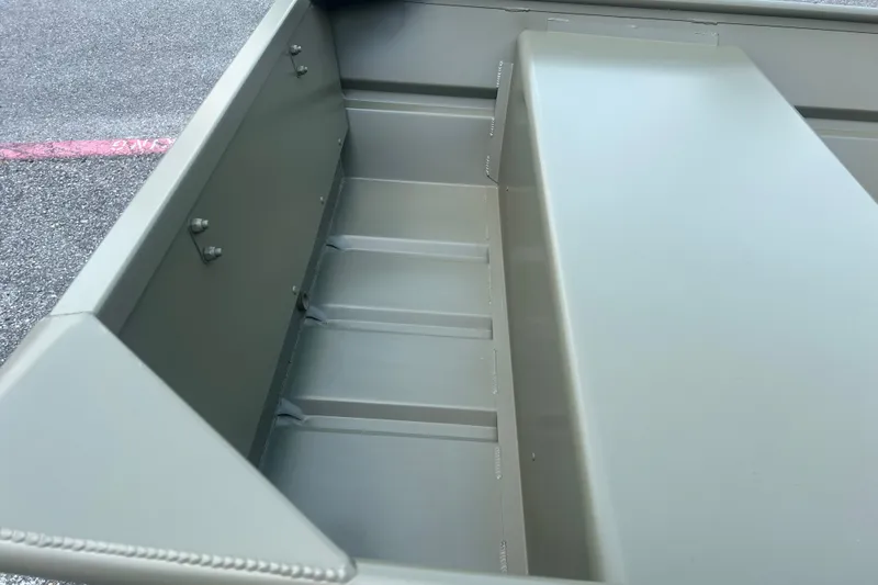 Slide: The Image of Interior view of 2026 Tracker Grizzly 12 Jon boat, showcasing sturdy construction. - 9