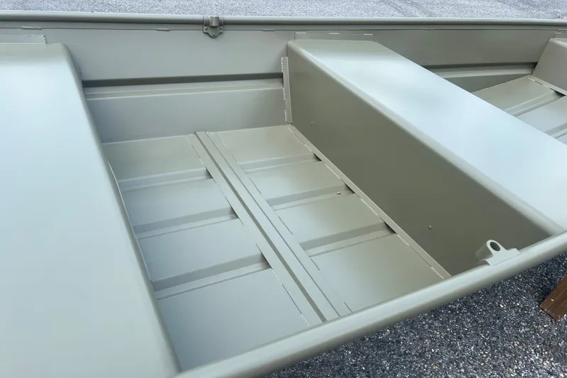 Slide: The Image of 2026 Tracker Grizzly 12 Jon boat interior, showcasing durable seating and spacious design. - 8