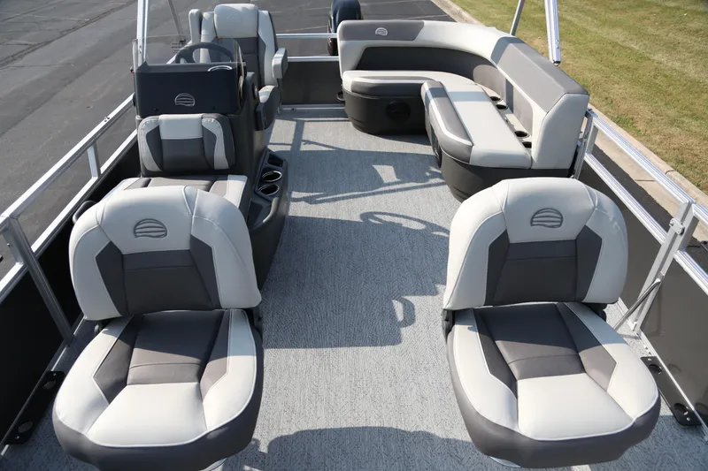 Slide: The Image of 2026 Sun Tracker Bass Buggy 16 XL Select pontoon boat interior with comfortable seating. - 2