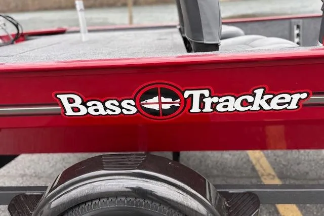 Slide: The Image of 2026 Tracker Bass Tracker Classic XL boat with red exterior and logo. - 83