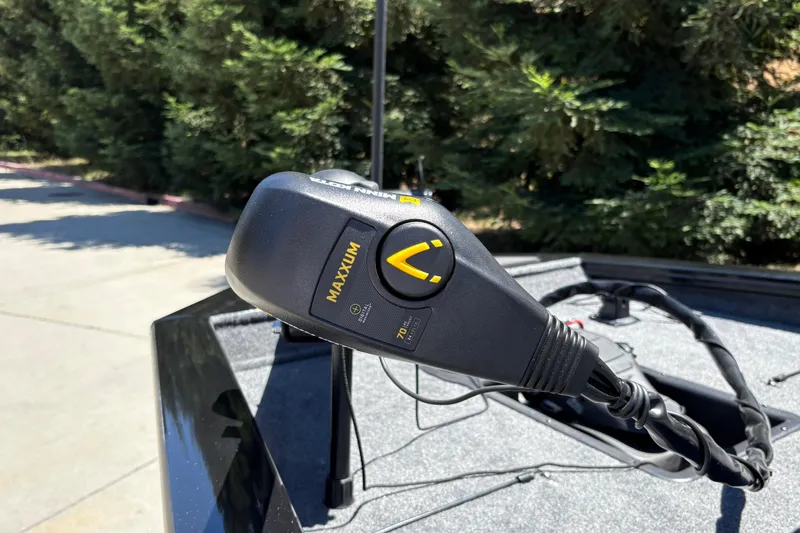 Slide: The Image of Trolling motor control on 2026 Tracker Pro Team 190 boat, outdoors. - 40