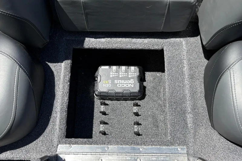 Slide: The Image of 2026 Tracker Pro Team 190 boat interior with NOCO Genius GEN5X3 charger. - 29