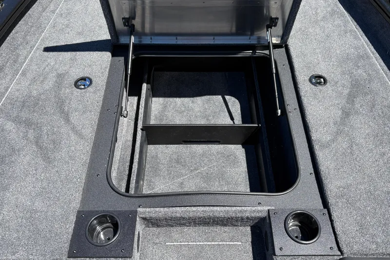 Slide: The Image of Open storage compartment on 2026 Tracker Pro Team 190 boat deck. - 33