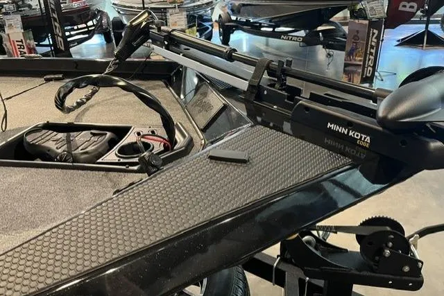 Slide: The Image of 2026 Ranger RT178 boat with Minn Kota trolling motor in showroom. - 8