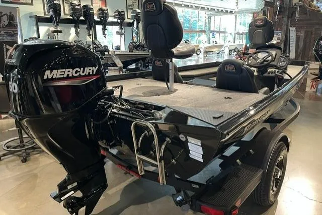 Slide: The Image of 2026 Ranger RT178 boat with Mercury engine displayed in showroom. - 7