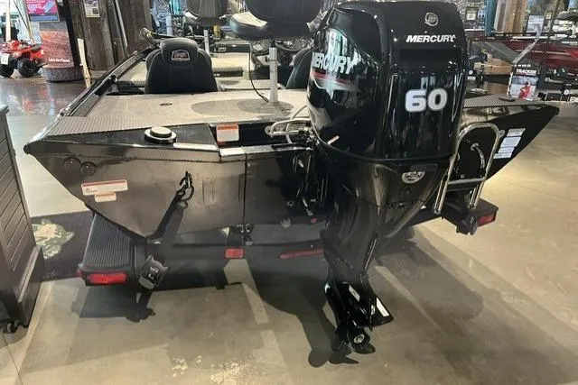 Slide: The Image of 2026 Ranger RT178 boat with Mercury 60 outboard motor displayed indoors. - 9
